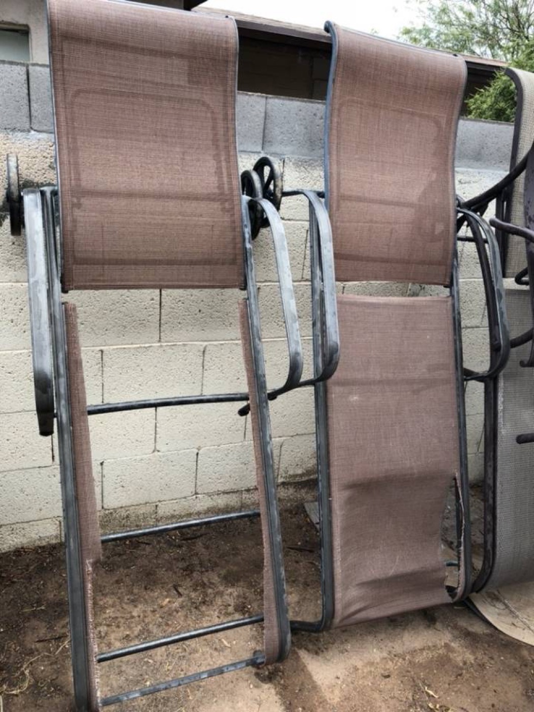Chaise lounge frames with worn sling fabric